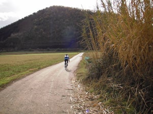 Click for larger image Training partner, David Millar in front of the Garrotxa volcano.