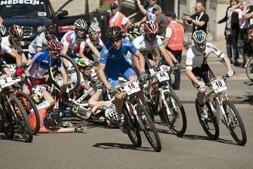 A crash at the start of the Junior field at the Houffalize World Cup stop in Belgium. Photo by UCI