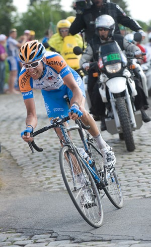 Stage 3, 2010 Tour de France Ryder Hesjedal attacking over the cobbles.