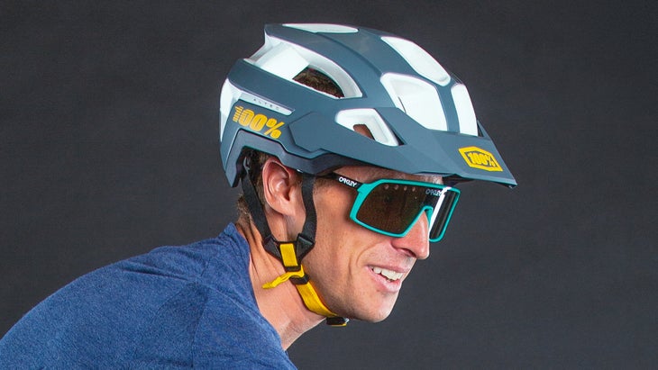 Close-up of man wearing cycling helmet and glasses
