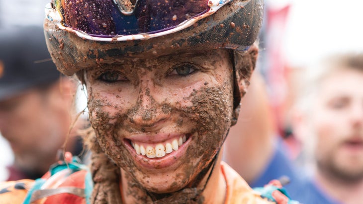 Hannah Finchamp covered in mud