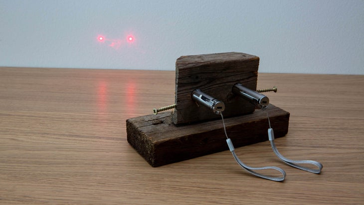 Lasers hitting a blank wall