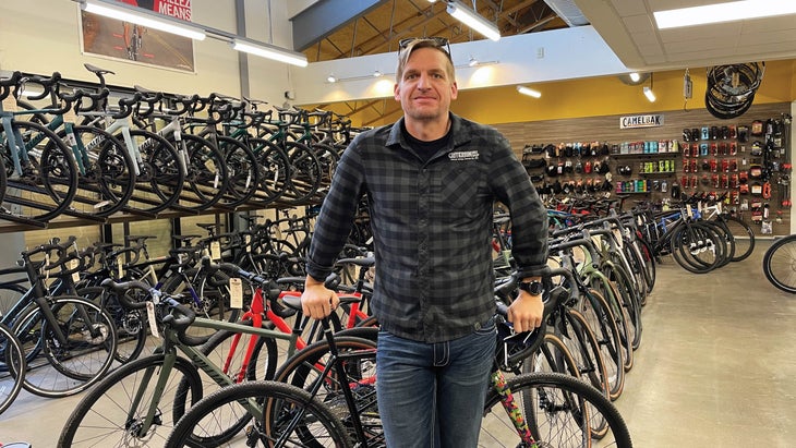Ponsor in front of rows of bicycles