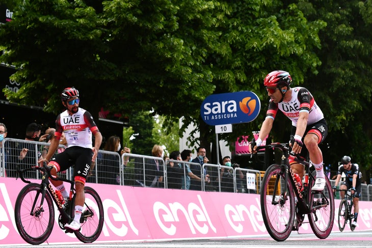 NOVARA, ITALY - MAY 09: Fernando Gaviria Rendon of Colombia & Maximiliano Ariel Richeze of Argentina and UAE Team Emirates disappointment at arrival during the 104th Giro d'Italia 2021, Stage 2 a 179km stage from Stupinigi (Nichelino) to Novara / @girodiitalia / #Giro / #UCIworldtour / on May 09, 2021 in Novara, Italy. (Photo by Stuart Franklin/Getty Images)