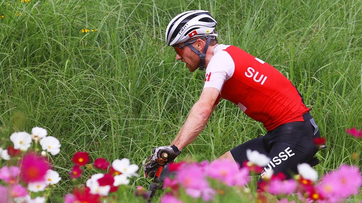 Mathias Flueckiger, on his way to a silver medal, bested compatriot and three-time Olympic mountain bike medalist Nino Schurter.