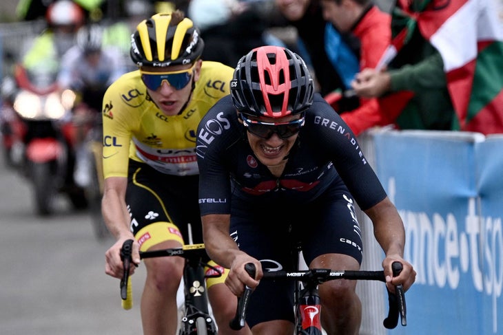 Team Ineos Grenadiers' Richard Carapaz of Ecuador (R) rides ahead of Team UAE Emirates' Tadej Pogacar of Slovenia wearing the overall leader's yellow jersey during the 17th stage of the 108th edition of the Tour de France cycling race, 178 km between Muret and Saint-Lary-Soulan, on July 14, 2021. (Photo by Anne-Christine POUJOULAT / AFP) (Photo by ANNE-CHRISTINE POUJOULAT/AFP via Getty Images)