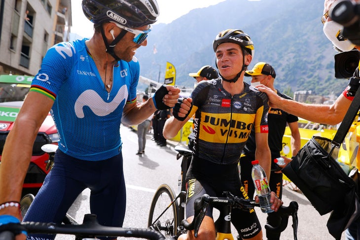Sepp Kuss and Alejandro Valverde talk after stage 15 of the Tour de France