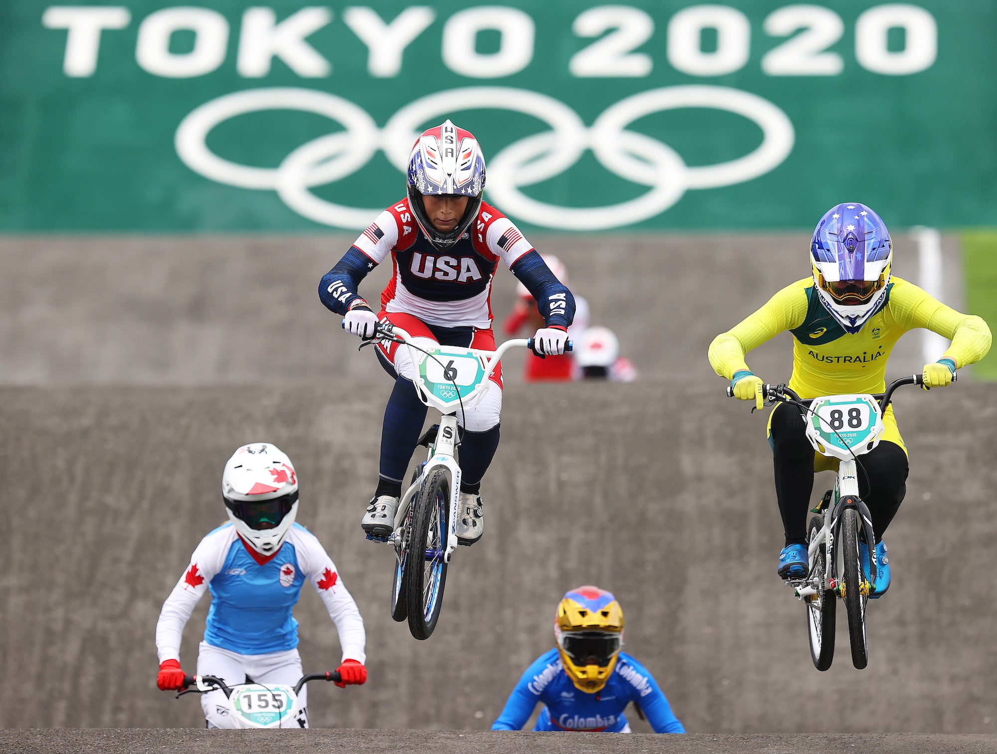 TOKYO, JAPAN - JULY 30: (L-R) Felicia Stancil of Team United States and Saya Sakakibara of Team Australia as they jump during the Women's BMX semifinal heat 1, run 1 on day seven of the Tokyo 2020 Olympic Games at Ariake Urban Sports Park on July 30, 2021 in Tokyo, Japan. (Photo by Francois Nel/Getty Images)
