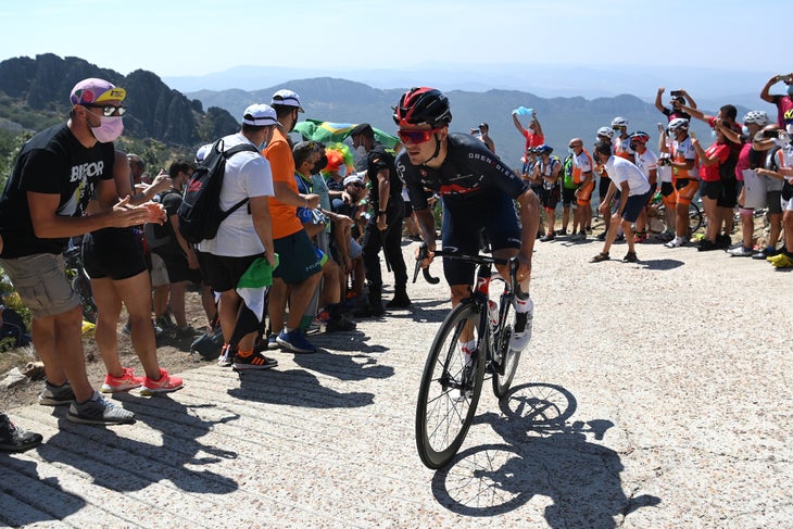 PICO VILLUERCAS, SPAIN - AUGUST 28: Thomas Pidcock of United Kingdom and Team INEOS Grenadiers climbs the Pico Villuercas (1580m) while fans cheer during the 76th Tour of Spain 2021, Stage 14 a 165,7km stage from Don Benito to Pico Villuercas 1580m / @lavuelta / #LaVuelta21 / on August 28, 2021 in Pico Villuercas, Spain. (Photo by Stuart Franklin/Getty Images)