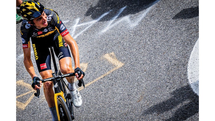 Sepp Kuss rounding a corner