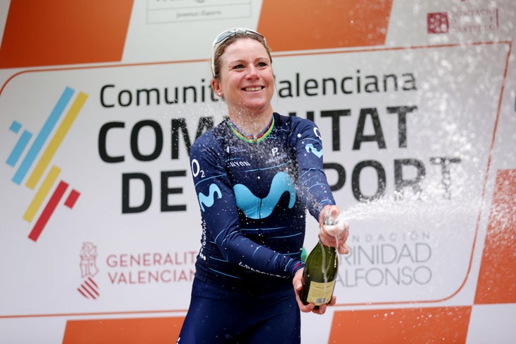 Annemiek van Vleuten sprays the champagne after winning in Valencia