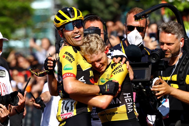 Tom Dumoulin hugs Koen Bouwman after Bouwman wins a stage of the Giro d'Italia
