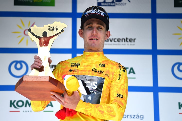 GYÖNGYÖS-KÉKESTETŐ, HUNGARY - MAY 15: Eddie Dunbar of Ireland and Team INEOS Grenadiers celebrates at podium as Yellow Leader Jersey final winner during the 43rd Tour de Hongrie 2022 - Stage 5 a 184km stage from Miskolc to Gyöngyös-Kékestető 992m / #tourdehongrie / on May 15, 2022 in Gyöngyös-Kékestető, Hungary. (Photo by Dario Belingheri/Getty Images)