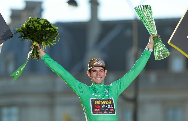 PARIS, FRANCE - JULY 24: Winner of the Green jersey for best sprinter Wout van Aert of Belgium and Jumbo - Visma celebrates during the final podium ceremony following stage 21 of the 109th Tour de France 2022, a 115,6 km stage from Paris La Defense Arena to Paris Champs Elysees / #TDF2022 / #WorldTour / on July 24, 2022 in Paris, France. (Photo by Jean Catuffe/Getty Images)
