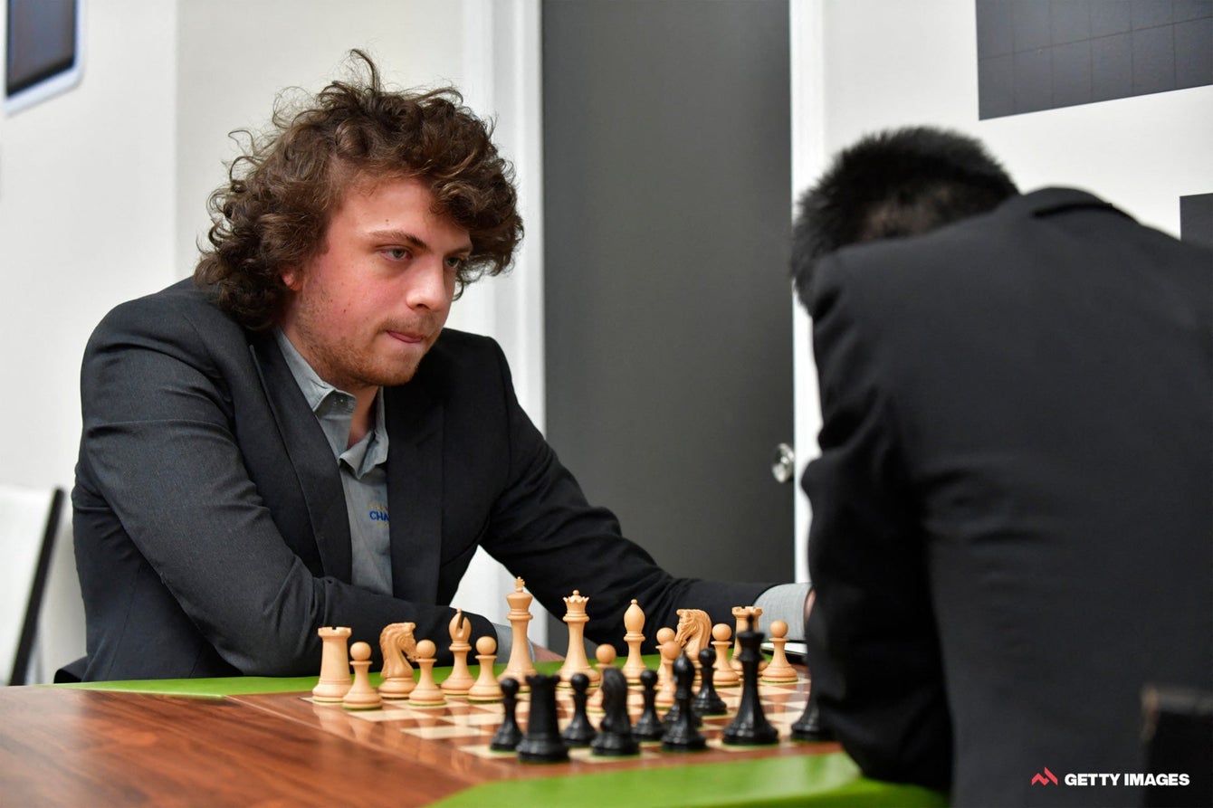Hans looking in good spirits with his fellow players during the rest day! :  r/chess