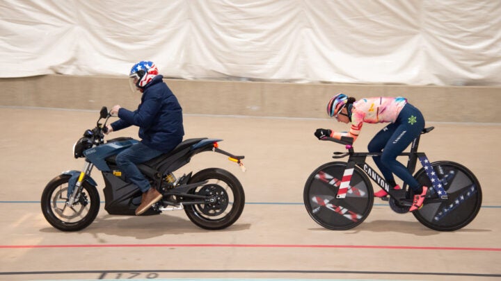 Coach Gary Sutton moto pacing Chloe Dygert during her first session back on the track.