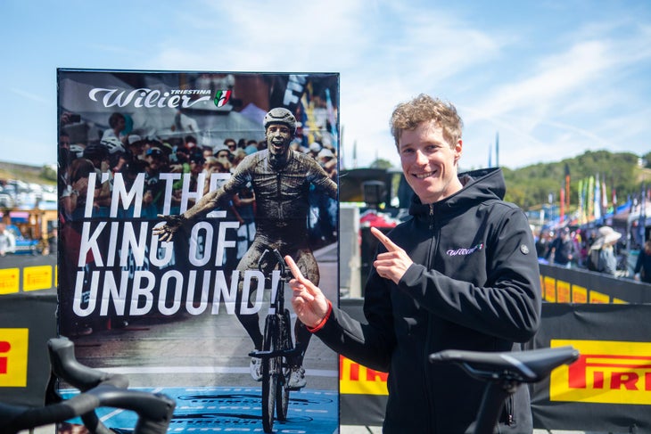 Ivar Slik poses with a picture of his Unbound gravel Win