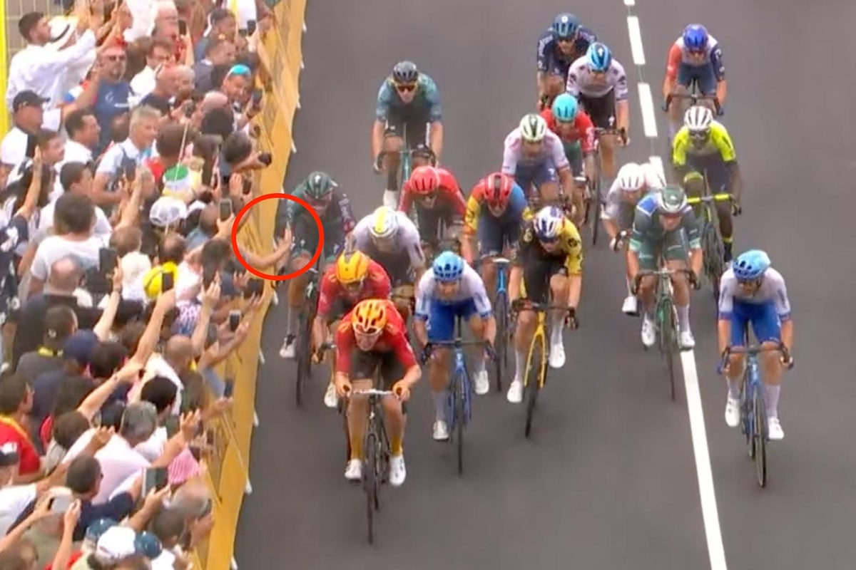 How hectic are Tour de France sprints? Jordi Meeus hits spectator, bumps shoulders at 40 mph, and still doesn't crash