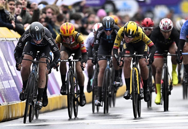 US Megan Jastrab of Team DSM (L) and Dutch Karlijn Swinkels of Team Jumbo-Visma (R) sprint to the finish line in the women's Gent-Wevelgem-In Flanders Fields cycling race, from Ypre to Wevelgem, northwestern Belgium, on March 26, 2023. (Photo by JASPER JACOBS/Belga/AFP via Getty Images)