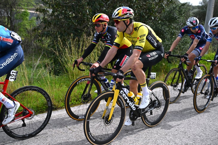 TAVIRA, PORTUGAL - FEBRUARY 16: (L-R) Remco Evenepoel of Belgium and Team Soudal - Quick Step and Wout Van Aert of Belgium and Team Visma | Lease a Bike compete during the 50th Volta ao Algarve em Bicicleta 2024, Stage 3 a 192.2km stage from Vila Real de Santo Antonio to Tavira on February 16, 2024 in Tavira, Portugal. (Photo by Dario Belingheri/Getty Images)