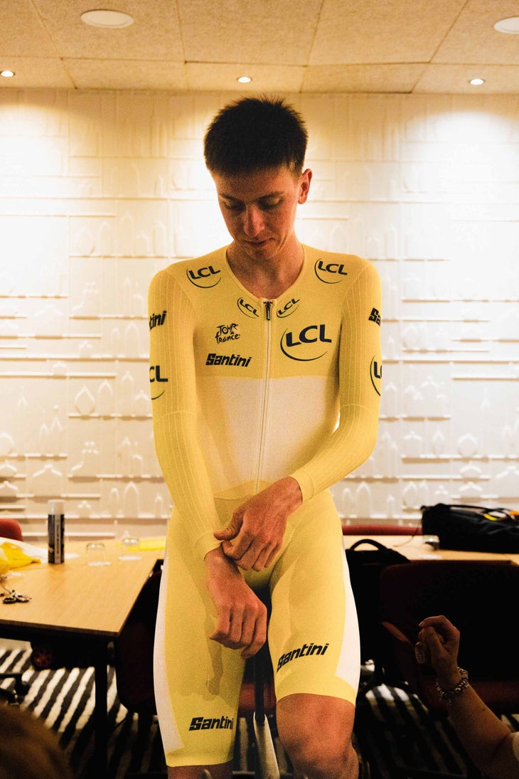 Tadej Pogacar time trial speedsuit fitting for a custom tailored fit at the 2024 Tour de France