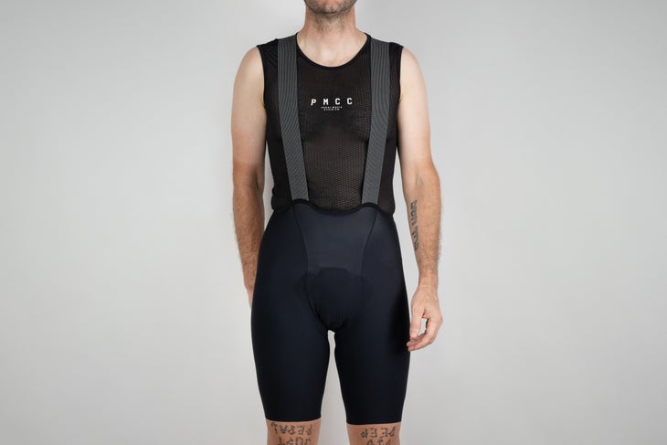 front view of bib shorts on white