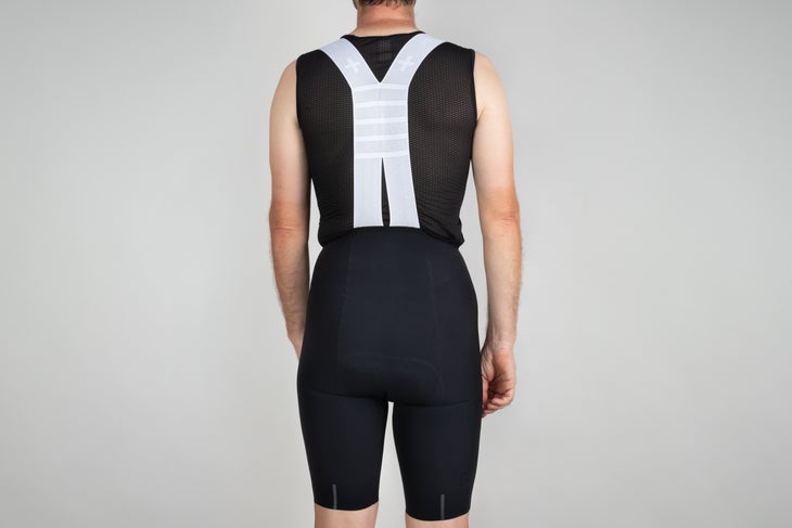 Rear view of bib shorts on white