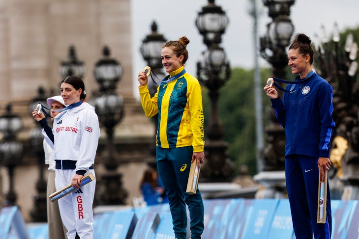 PARIS, FRANCE - JULY 27: Silver medallist Anna Henderson (GBR), gold medallist Grace Brown (AUS) and bronze medallist Chloe Dygert (USA) pose with medals during the Women's Individual Time Trial on day one of the Olympic Games Paris 2024 at Pont Alexandre III during the Paris 2024 Olympics Games on july 27, 2024, in Paris, Spain. (Photo By Manu Reino/Europa Press via Getty Images)