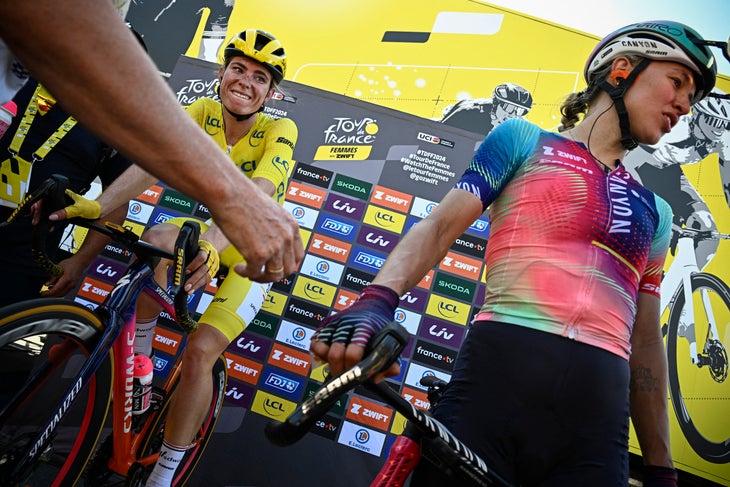 Team SD Worx - Protime's Demi Vollering (L) and Canyon-SRAM's Kasia Niewiadoma (R). Vollering appears in anguish after losing her overall leader yellow jersey at end of the 5th stage (out of 8) of the 2024 Tour de France Femmes, held over 152.5 km between Bastogne in southeastern Belgium and Amneville in northeastern France, on August 15, 2024. (Photo by JULIEN DE ROSA / AFP)