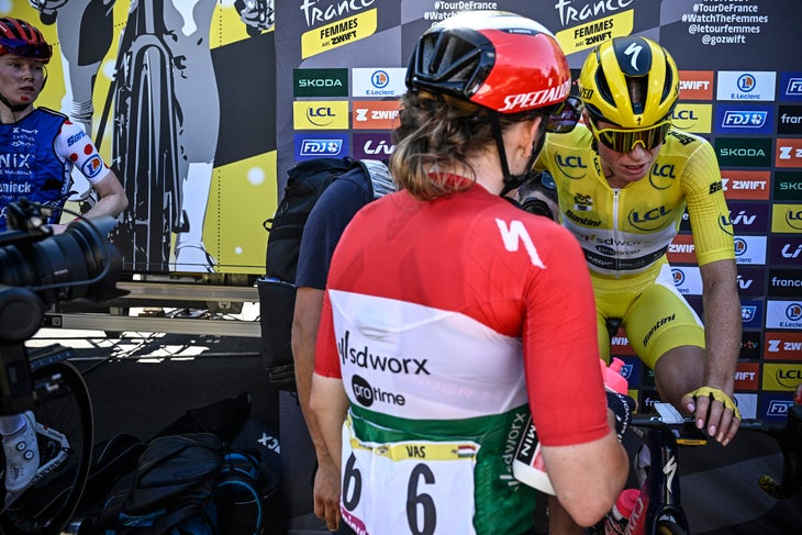 Team SD Worx - Protime's Hungarian rider Blanka Vas (L) speaks with Team SD Worx - Protime's Dutch rider Demi Vollering after the 5th stage (out of 8) of the third edition of the Women's Tour de France cycling race, a 152.5 km between Bastogne in southeastern Belgium and Amneville in northeastern France, on August 15, 2024. (Photo by JULIEN DE ROSA / AFP)