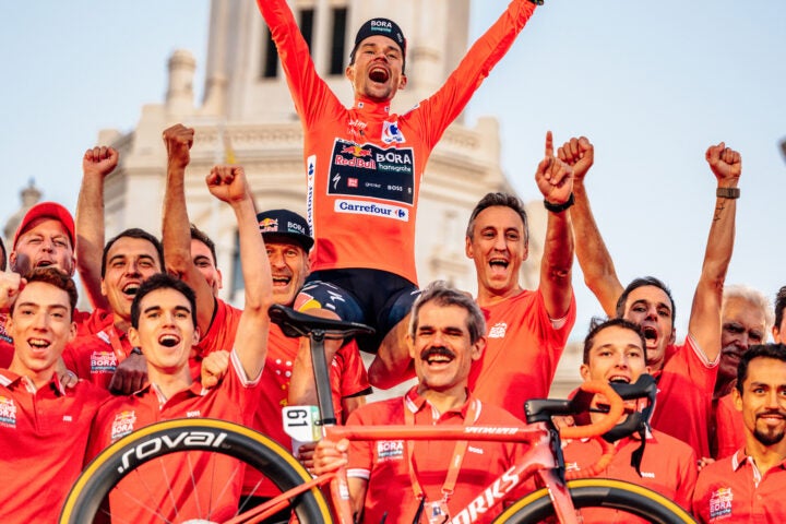 Primož Roglič celebrates with the rider and staff of the Red Bull-Bora-Hansgrohe team (photo by Chris Auld).