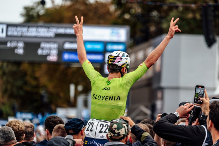 Tadej Pogačar celebrates winning the 2024 UCI Road World Championships.