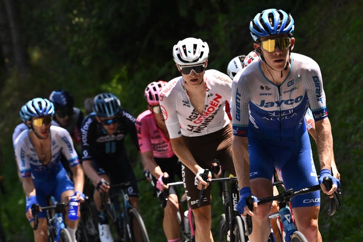 Team Jayco Alula's US rider Lawson Craddock (R) cycles ahead of a breakaway during the 17th stage of the 110th edition of the Tour de France cycling race, 166 km between Saint-Gervais Mont-Blanc and Courchevel, in the French Alps, on July 19, 2023. (Photo by Marco BERTORELLO / AFP)