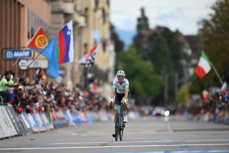 ZURICH, SWITZERLAND - SEPTEMBER 29: Ben O'connor of Team Australia crosses the finish line silver medal winner during the 97th UCI Cycling World Championships Zurich 2024, Men's Elite Road Race a 273.9km one day race from Winterthur to Zurich on September 29, 2024 in Zurich, Switzerland. (Photo by Tim de Waele/Getty Images)