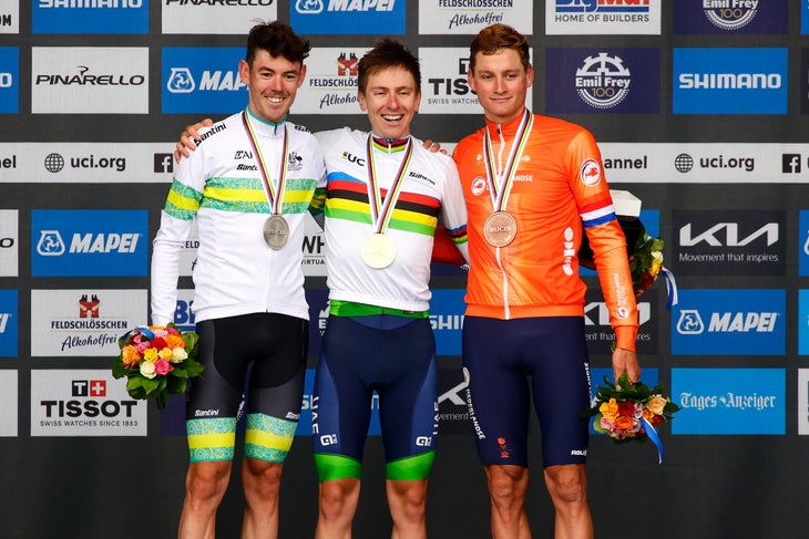 ZURICH, SWITZERLAND - SEPTEMBER 29: Tadej Pogacar from Team Slovenia, (C) Ben Oconnor from Team Australia and Mathieu van der Poel from Team Netherlands (R) celebrate with their medals at the podium during the Men Elite Road Race in 97th UCI Cycling World Championships Zurich on September 29, 2024 in Zurich, Switzerland. (Photo by Joan Cros - Corbis/Getty Images)