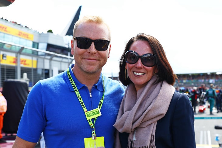 Olympic Star Chris Hoy Reveals Terminal Cancer Diagnosis 2 NORTHAMPTON, ENGLAND - JULY 07: Sir Chris Hoy and Sarra Hoy pose for a photo on the grid during the F1 Grand Prix of Great Britain at Silverstone Circuit on July 07, 2024 in Northampton, England. (Photo by Mark Thompson/Getty Images)