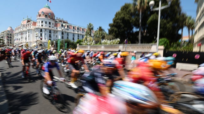 The pack of riders passes the Hotel Le Negresco pictured at the start of stage 20 of the 2024 Tour de France cycling race, from Nice to Col de la Couillole (132,8 km), in France, on Saturday 20 July 2024. The 111th edition of the Tour de France starts on Saturday 29 June and will finish in Nice, France on 21 July. BELGA PHOTO DAVID PINTENS (Photo by DAVID PINTENS / BELGA MAG / Belga via AFP)
