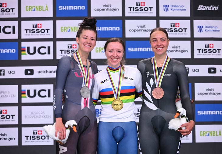 Chloé Dygert Pummels Her Own World Record at Track Worlds 2 (L-R) Second placed USA's Chloe Dygert, winner Britain's Anna Morris and third placed New Zealand's Bryony Botha celebrate during the podium ceremony after the Women's Individual Pursuit Race of the UCI Track Cycling World Championships in Ballerup, Denmark, on October 19, 2024. (Photo by Jonathan NACKSTRAND / AFP)