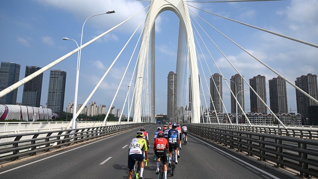 NANNING, CHINA - OCTOBER 20: (L-R) Kevin Colleoni of Italy and Team Intermarche - Wanty, Ewen Costiou of France and Team Arkea - B&B Hotels, Joseph Blackmore of The United Kingdom and Team Israel - Premier Tech and a general view of the peloton competing during the 5th Gree-Tour of Guangxi 2024, Stage 6 a 134km stage from Nanning to Nanning / #UCIWT / on October 20, 2024 in Nanning, China. (Photo by Dario Belingheri/Getty Images)