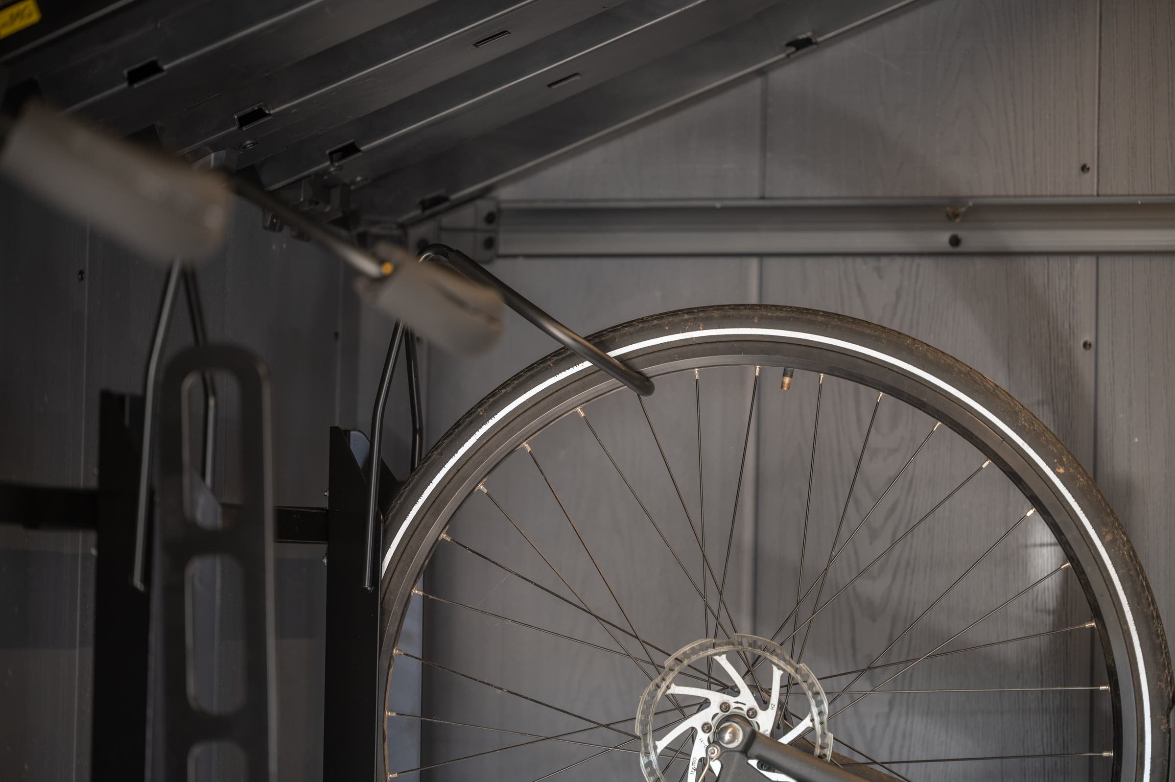 Keter Newton Plus shed with Saris rack for secure bike storage