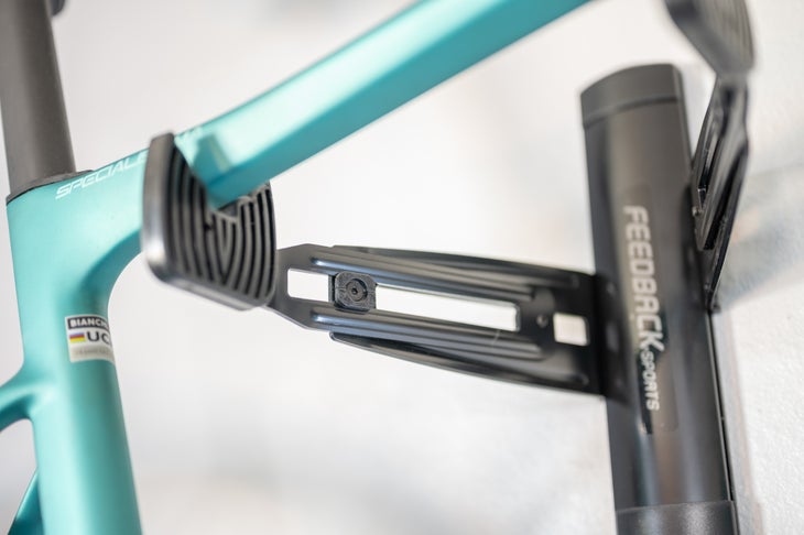 bianchi specialissima sitting on a Feedback Sports Velo Wall Rack 2D
