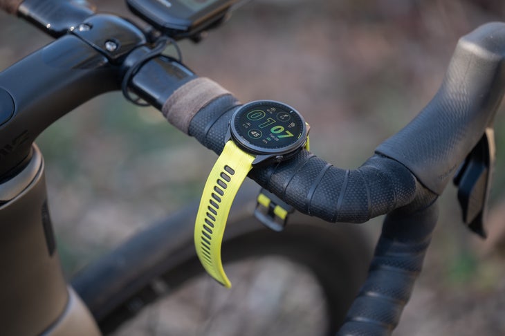 Garmin Instinct 965 watch mounted to handlebars