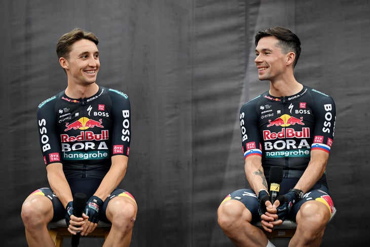 SALZBURG, AUSTRIA - JUNE 26: (L-R) Jai Hindley of Australia and Primoz Roglic of Slovenia and Team Red Bull - BORA - hansgrohe during the Official launch Team Red Bull - BORA - hansgrohe in Red Bull Hangar-7 on June 26, 2024 in Salzburg, Austria. (Photo by Tim de Waele/Getty Images)