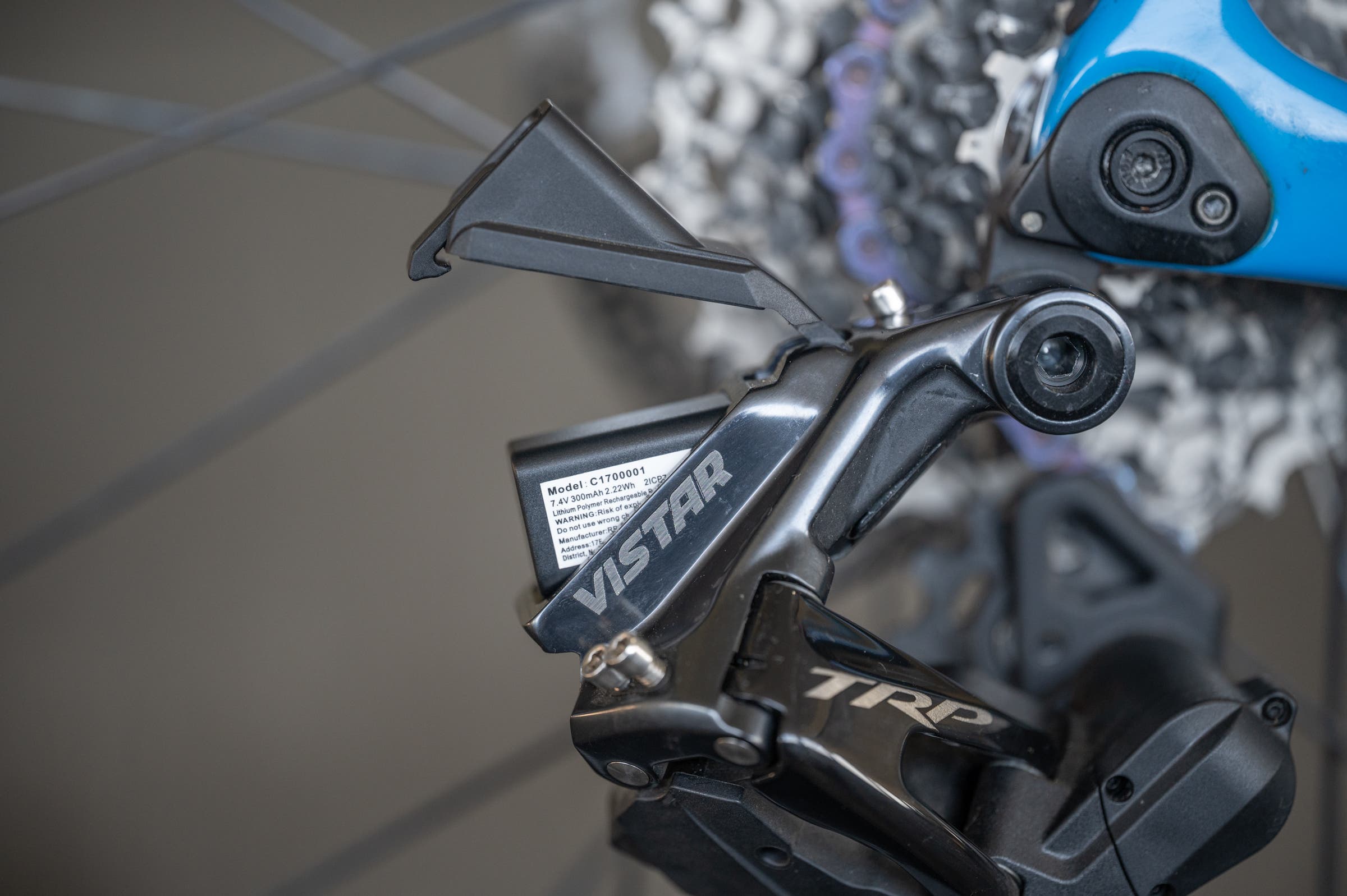 TRP Vistar battery being inserted into rear derailleur