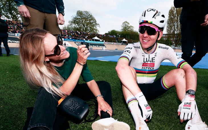 ROUBAIX, FRANCE - APRIL 13: (L-R) Urska Zigart of Slovenia and Tadej Pogacar of Slovenia and UAE Team Emirates - XRG react after the 122nd Paris - Roubaix 2025 a 259.2km one day race from Compiegne to Roubaix / #UCIWT / on April 13, 2025 in Roubaix, France. (Photo by Luca Bettini - Pool/Getty Images)