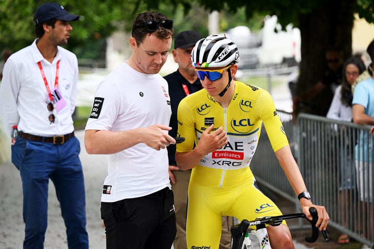 VAL-D'ARC, FRANCE - JUNE 15: Tadej Pogacar of Slovenia and UAE Team Emirates - XRG - Yellow leader jersey watching the race in which Urska Zigart of Slovenia participates prior to the 77th Criterium du Dauphine 2025, Stage 8 a 133.3km stage from Val-d'Arc›Plateau du Mont-Cenis 2095m / #UCIWT / on June 15, 2025 in Val-d'Arc, France. (Photo by Dario Belingheri/Getty Images)