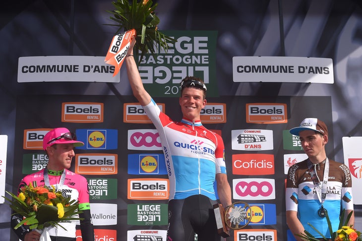 LIEGE, BELGIUM - APRIL 22: Podium / Michael Woods of Canada and Team EF Education First - Drapac P/B Cannondale / Bob Jungels of Luxembourg and Team Quick-Step Floors / Romain Bardet of France and Team AG2R La Mondiale / Celebration / Trophy / during the104th Liege-Bastogne-Liege 2018 a 258,5km race from Liege to Liege-Ans on April 22, 2018 in Liege, Belgium. (Photo by Tim de Waele/Getty Images)