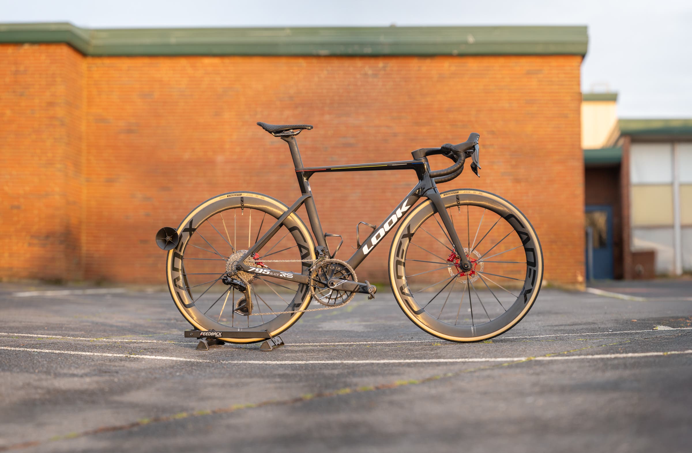 A Look 795 Blade RS carbon race bike in Pro Team colors, equipped with a Shimano Dura-Ace Di2 electronic drivetrain, FSA, and CeramicSpeed component