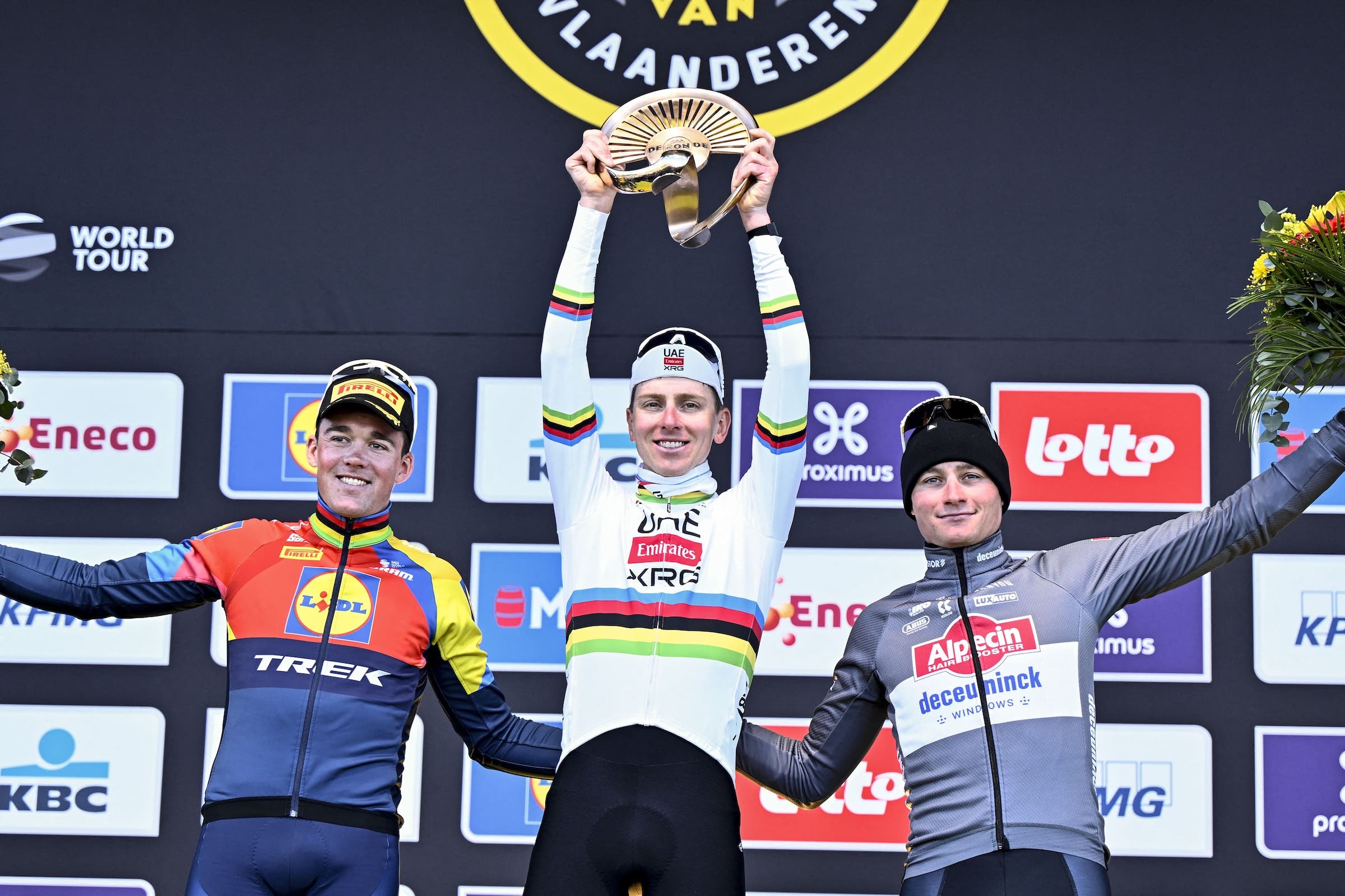 Danish Mads Pedersen of Lidl-Trek, Slovenian Tadej Pogacar of UAE Team Emirates and Dutch Mathieu van der Poel of Alpecin-Deceuninck pictured on the podium after the men's race of the 'Ronde van Vlaanderen/ Tour des Flandres/ Tour of Flanders' one day cycling race Sunday 6 April 2025. (Photo: Eric Lalmand / Belga Mag via AFP) 