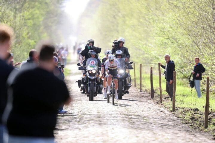 UAE Emirates-XRG's Slovenian rider Tadej Pogacar rides with his team over the cobblestones of the "trench" of Aremberg in Wallers, northern France, on April 9, 2026, to reconnoiter the cobblestones of the 123rd Paris-Roubaix race, which will take place on April 12. (Photo by )
